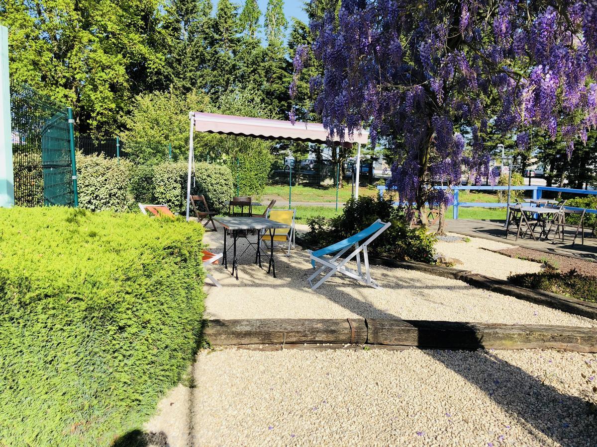 Hotel Au Relais Des Lilas ปาคเตอเนย์ ภายนอก รูปภาพ